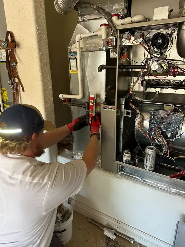 Element technician repairing a furnace in St. George, UT