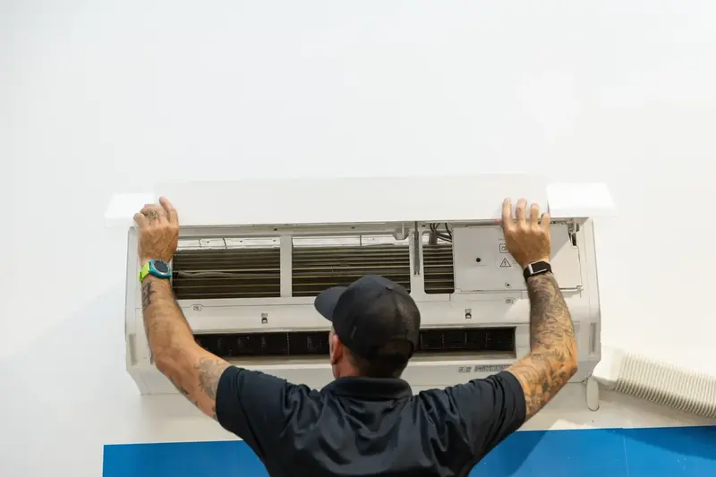 Element technician servicing a ductless mini split in St. George, UT