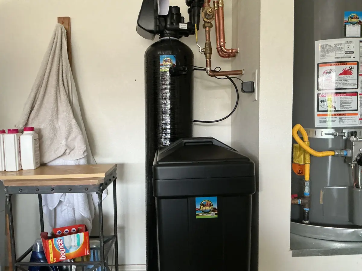 Water softener and brine tank beside a tank water heater in St. George, UT